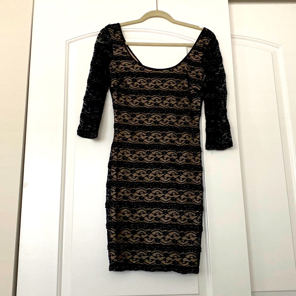 Black lace 3/4 sleeve dress. Mini/midi length